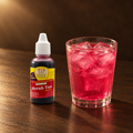Koepoe Koepoe Pewarna Makanan Merah 40g – Fläschchen mit rosa Getränk