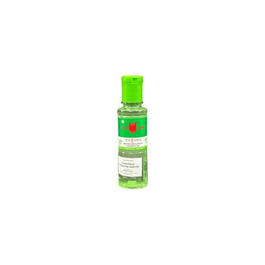 Massageöl Cap Lang mit Minyak Kayu Putih, Nesia Food, in einer Flasche mit weißem Etikett, ideal für Massage und Wohlbefinden
